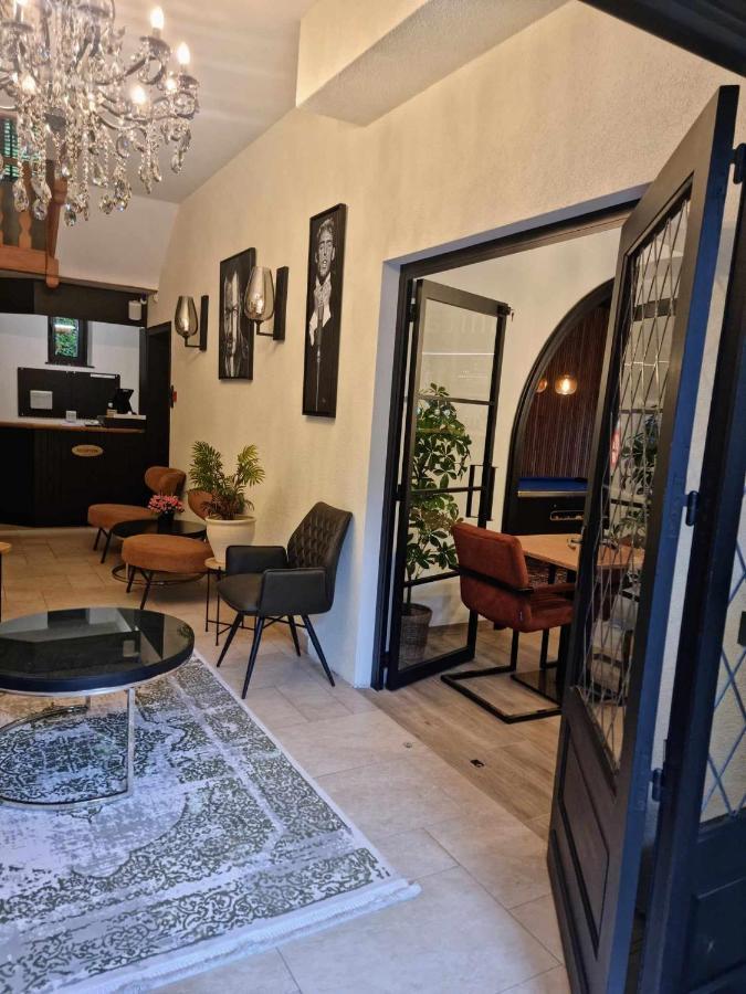 Hotel L'Ermitage อูฟฟาลีซ ภายนอก รูปภาพ